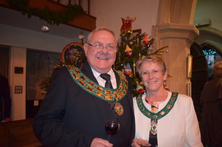 Image Mayor of Didcot, Councillor Bill Service and his wife Angela in front of a Christmas tree